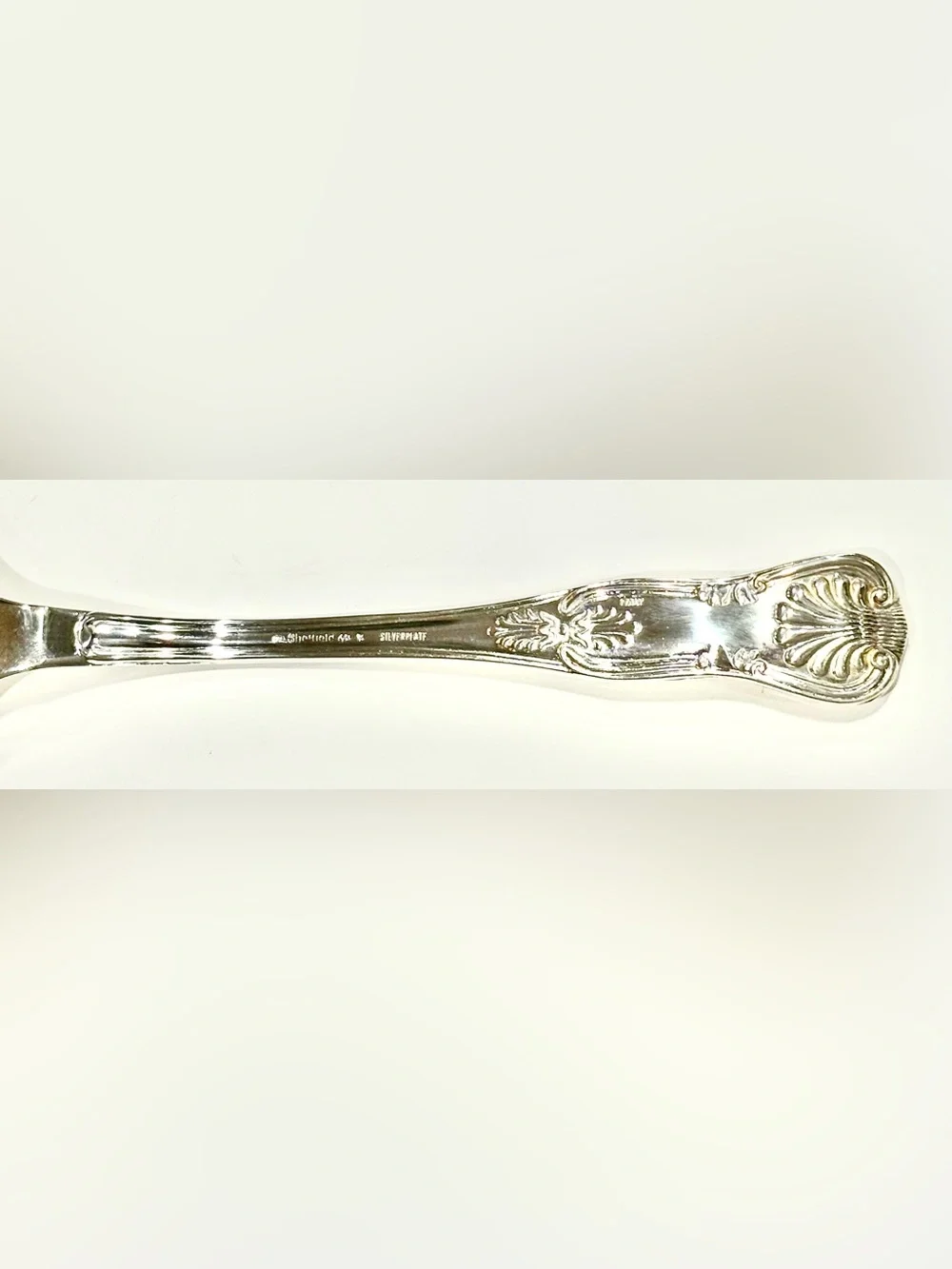 Vintage Polished Silver-Plated Server with Ornate Engraved Details